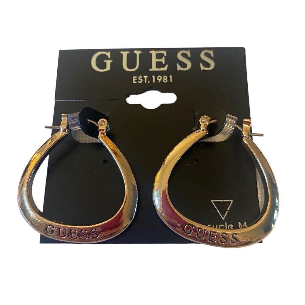 Bright Gold Toned Guess Embossed Earrings.